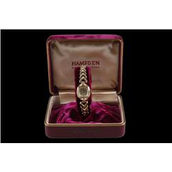Ladies Hampden Wristwatch 14K gold case, in original box, needs battery.14K gold case, in original b