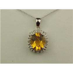 Charming 10K White Gold Ladies Pendant Set with a center oval citrine weighing approx. 3.00 carats a