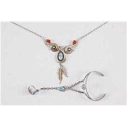 Lot of 2 Items Including a Native American sterling and turquoise slave bracelet and a sterling Nati