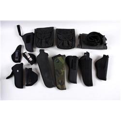 Bonanza Lot of Nylon Holsters 10 holsters, 1 belt, and 2 magazine holders.10 holsters, 1 belt, and 2