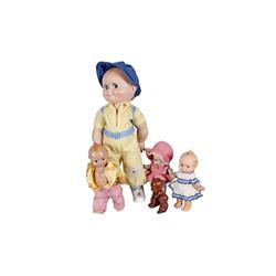Lot of Kewpie Dolls Including earlier composition, vinyl, and more.Including earlier composition, vi