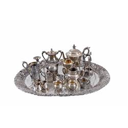 Large Lot of Silver Plate Consisting of serving spoons, knives, teapots, creamers, candlesticks, mar