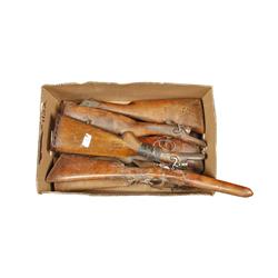 Lot of 9 Wood Shotgun Stocks Consists of stocks for early double barrel shotguns made in Belgium or 