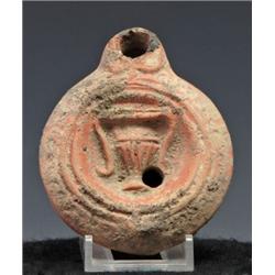 88: A Roman Redware Lamp with Amphora
