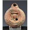 Image 1 : 88: A Roman Redware Lamp with Amphora