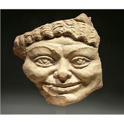 A Roman Terracotta Head of Medusa