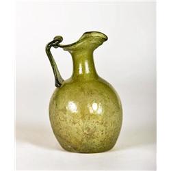 A Roman Green Glass Single-Handled Pitcher