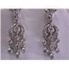 Image 1 : 18k White Gold Dangling Earrings with Diamonds
