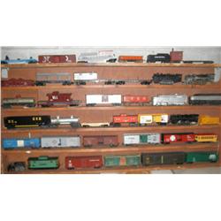 SHELF OF O GAUGE TRAINS