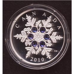 Lot of Eight $20 Crystal Snowflake Coins