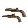 2 antique double barreled handguns