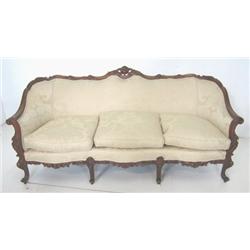 Couch with carved frame beige upholstery
