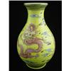 Image 1 : Vase with yellow background