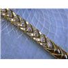 Image 1 : 14k Yellow Gold Bracelet with Baguettes Diamonds