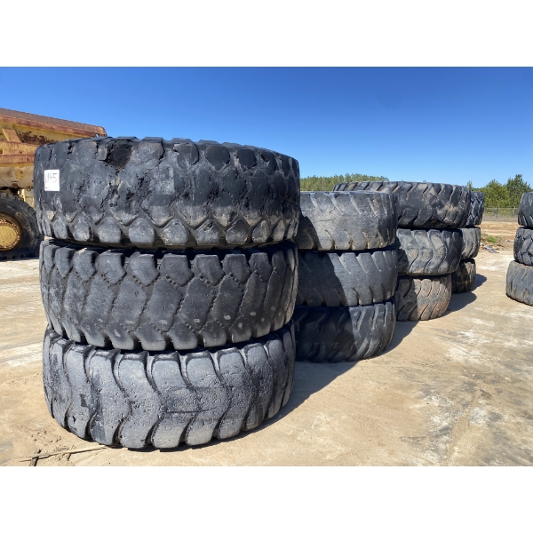 (9) 24.00-35 TIRES W/ RIMS