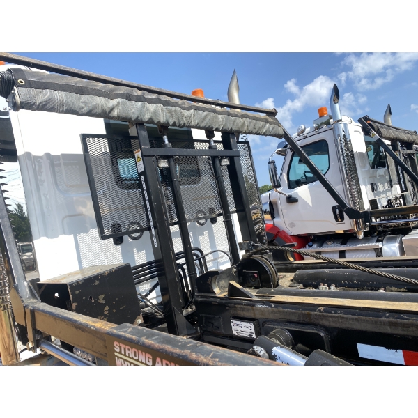 2023 WESTERN STAR 49X Roll Off Truck - J.M. Wood Auction Company, Inc.