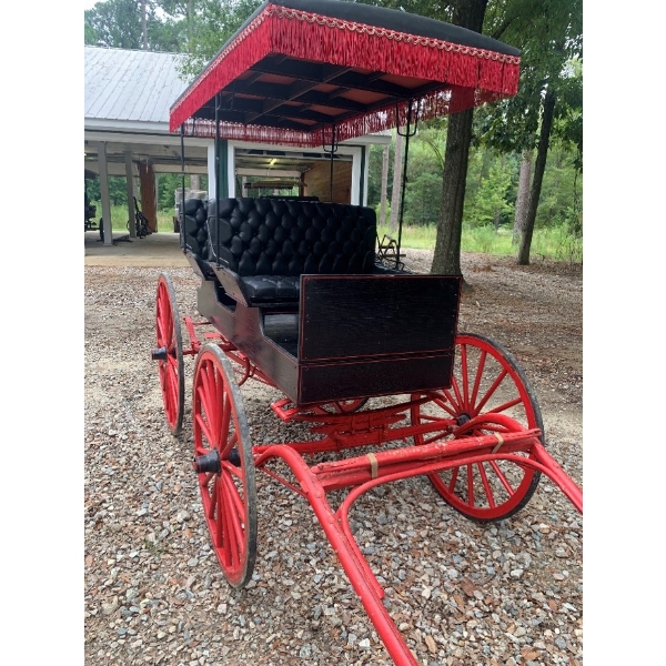 "BLACK AND RED TASSELED" HORSE-DRAWN CARRIAGE