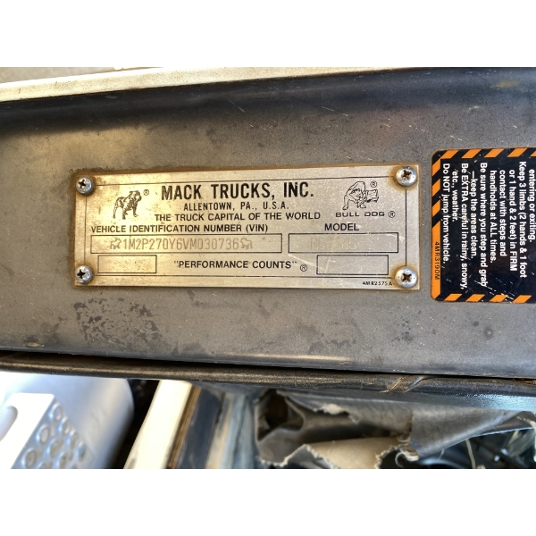 1997 MACK RD688S Dump Truck - J.M. Wood Auction Company, Inc.