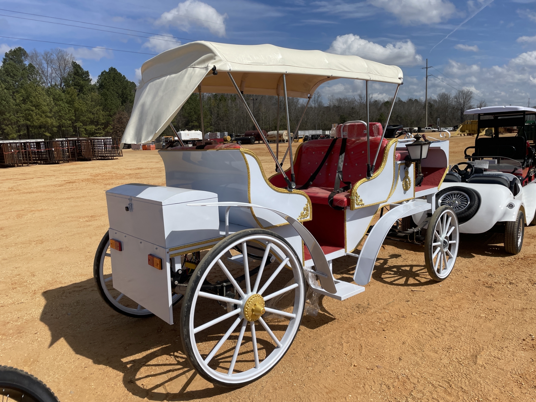 Horseless Rodeo 2025 SPIRIT ELECTRIC HORSELESS CARRIAGE - J.M. Wood Auction Company, Inc.