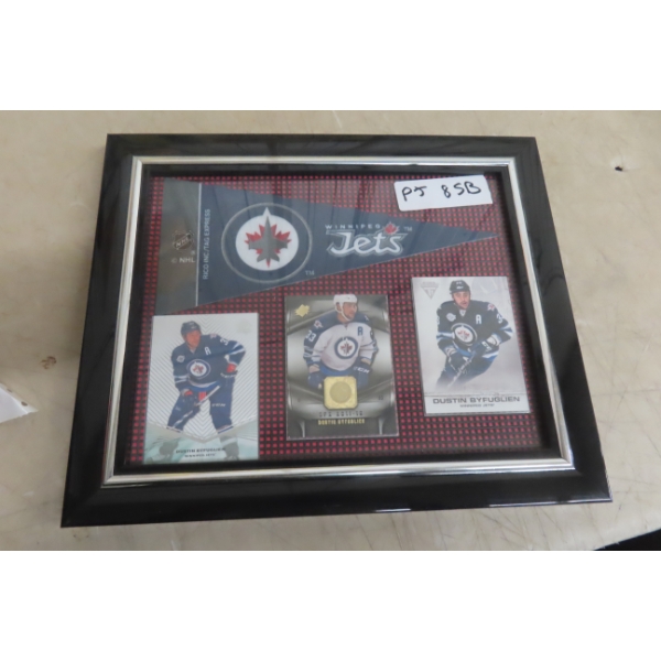 Framed Display Featuring Dustin Byfuglien Hockey Cards and Winnipeg Jets Pendant