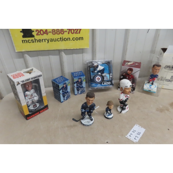 Hockey Bobbleheads and Figures Including Jacob Trouba, Chris Chelios, and Andrew Ladd