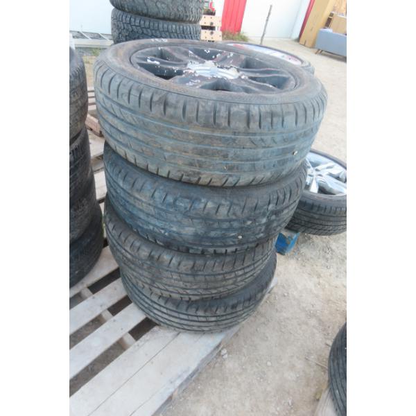 Set of 4 Tires on Rims, 235/55R18 — Good Used