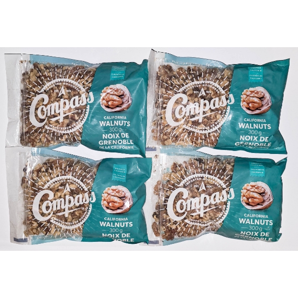 FOUR BAGS OF COMPASS CALIFORNIA WALNUTS