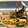 Image 1 : VINTAGE DIECAST CATERPILLAR GRADER & TIN MUSIC BOX CAR