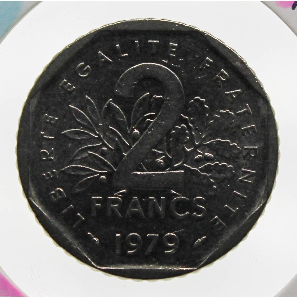 1979 UNC EIGHT SIDED 2 FRANCS COIN