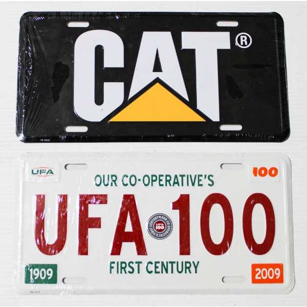 2 NEW FRONT LICENSE PLATES - CATERPILLAR & UFA 100 YRS