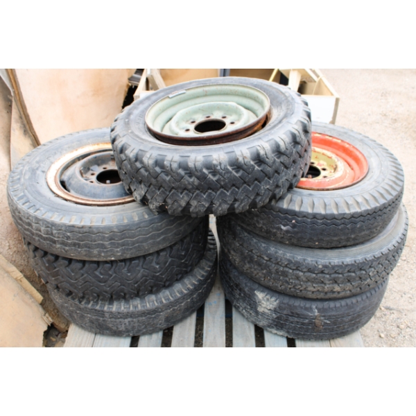 7 USED TRUCK TIRES WITH RIMS