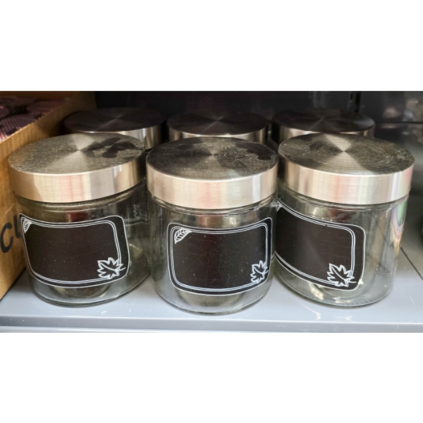 SIX GLASS STORAGE JARS