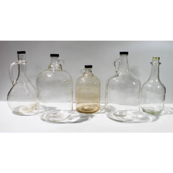 FIVE CLEAR GLASS VINTAGE WINE JUGS