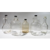 Image 1 : FIVE CLEAR GLASS VINTAGE WINE JUGS