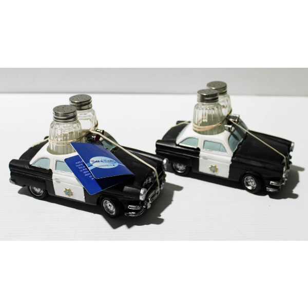 2 NEW SALT & PEPPER SHAKERS W/ POLICE CAR SET