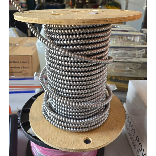 PARTIAL SPOOL OF HOME ELECTRICAL WIRE