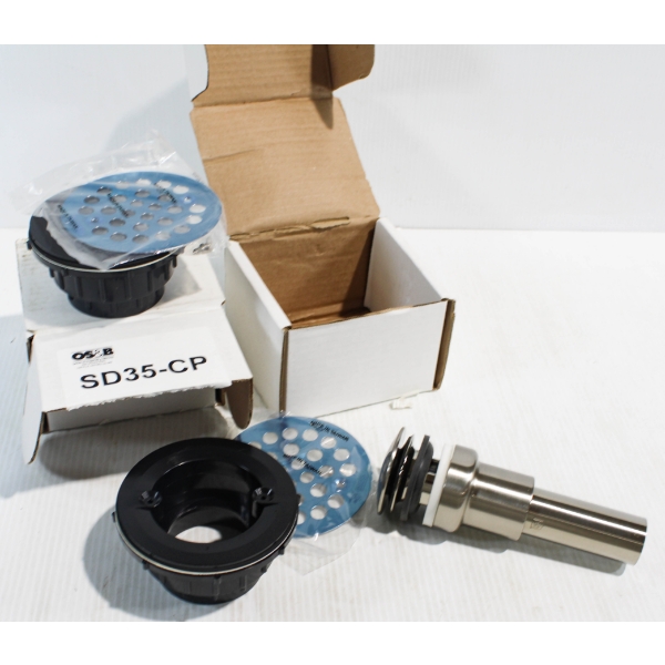 TWO NEW SHOWER DRAINS & BRUSH NICKLE DRAIN