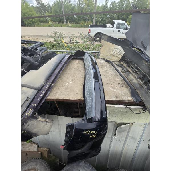 SALVAGED REAR BUMPER FOR 2010 DODGE CARAVAN