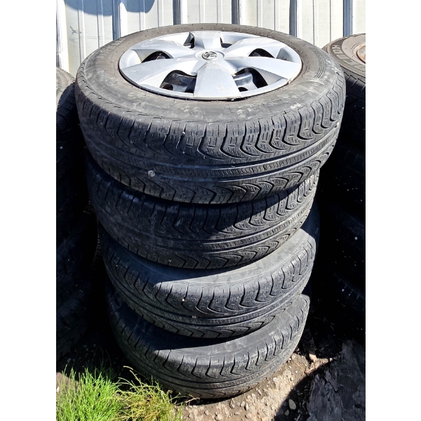 4 FIRELLI P4 P195/65 R15 TIRES W/ RIMS