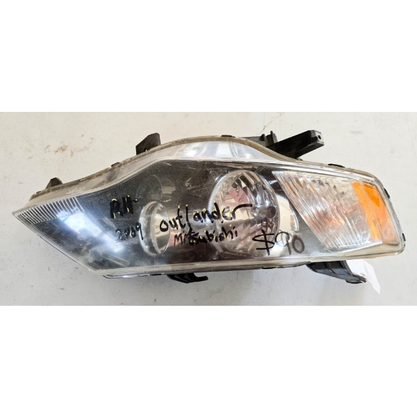 SALVAGE HEADLIGHT FOR '09 MITSUBISHI OUTLANDER