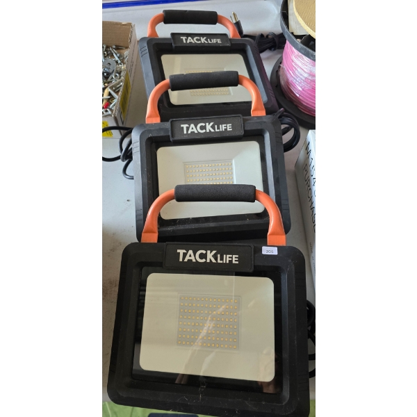 THREE TACKLIFE LED WORK LIGHTS