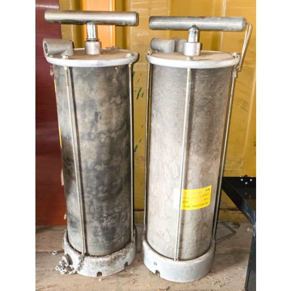 TWO MANUAL HAND PUMP CANISTERS