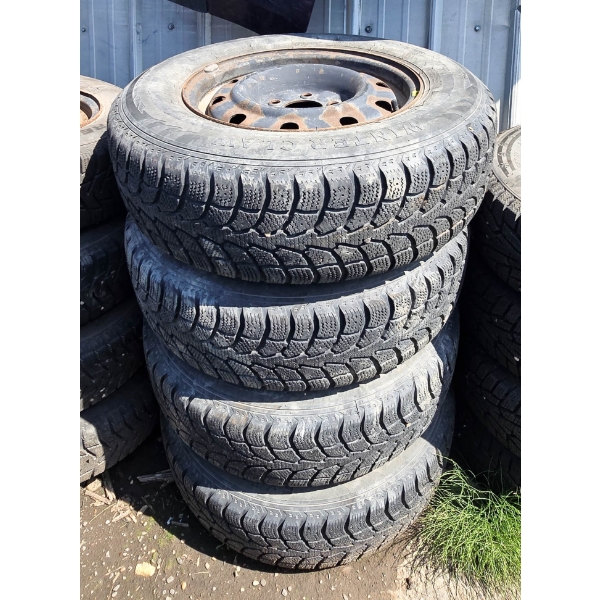 4 WINTER CLAW EXTREME GRIP 215/70 R15 TIRES