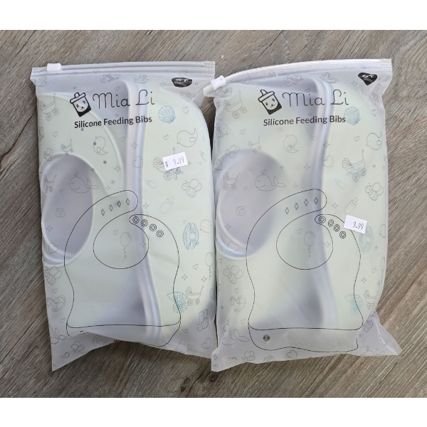 TWO SILICONE FEEDING BIBS