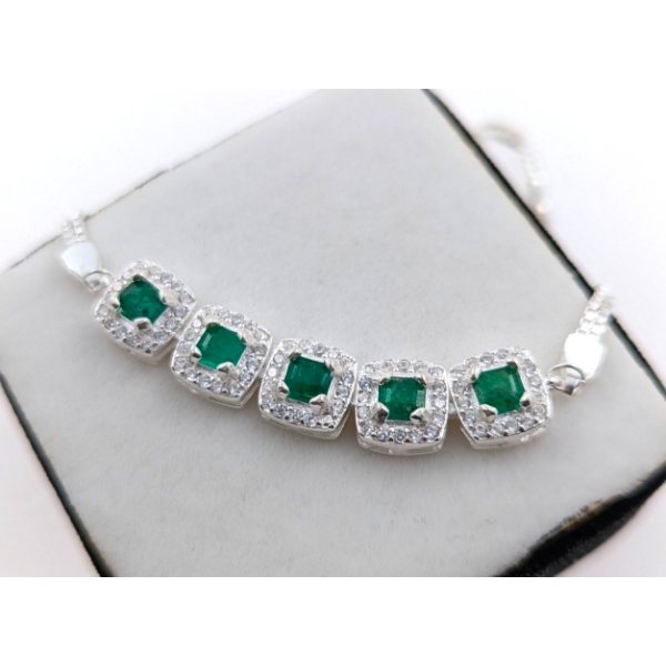 EMERALD & CUBIC ZIRCONIA STERLING SILVER BRACELET - EMERALD CUT CLAW SET ($4,626)