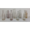 Image 3 : LOT OF 8 - CLEAR & PURPLE TINTED EMBOSSED SODA BOTTLES - INCL HOSMER, W.M. ROBERTSON, ETC