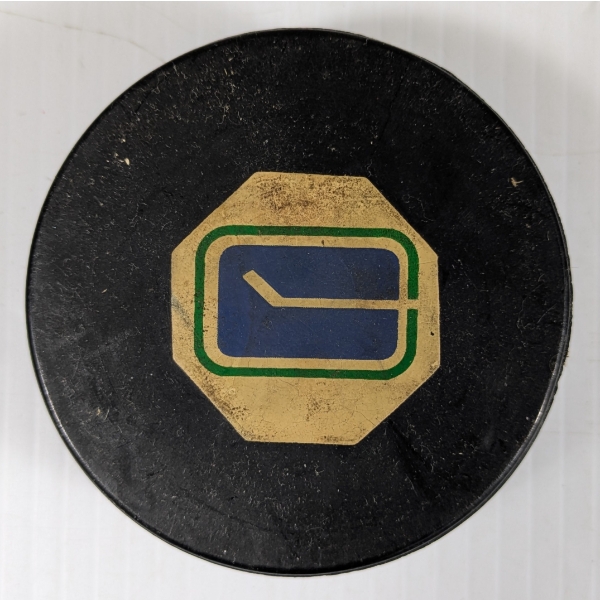 1969-1977 VANCOUVER CANUCKS ART ROSS HOCKEY GAME PUCK