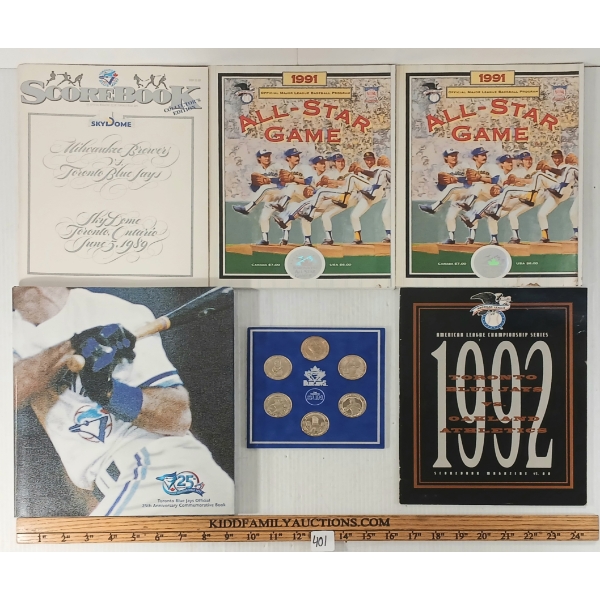 LOT OF 6 - TORONTO SUN BLUE JAYS TOKENS, 25TH ANNIVERSARY COMMEMORATIVE BOOK, 1991 PROGRAMS, ETC