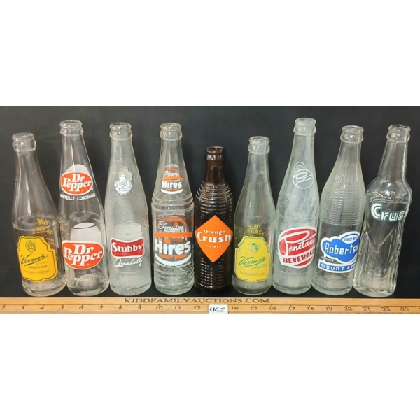 LOT OF 9 - POP BOTTLES - CRUSH, HIRE'S ROOT BEER, DR. PEPPER, VERNOR'S, PENETANG, STUBBY, ETC