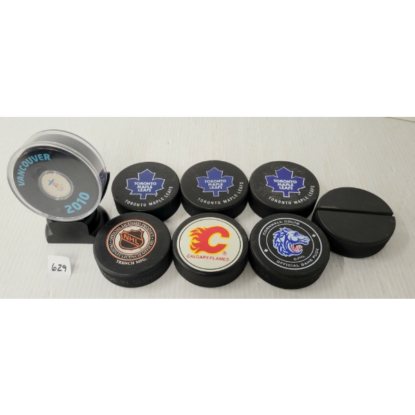  LOT OF 8 - MISC HOCKEY PUCKS - INCL 2010 VANCOUVER WINTER GAMES OLYMPIC 